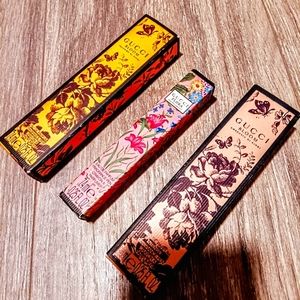 3 Gucci rollerball perfumes! Gucci Flora and 2 of the Gucci blooms.